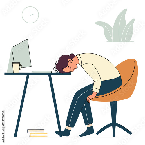 Person sitting at desk with head down