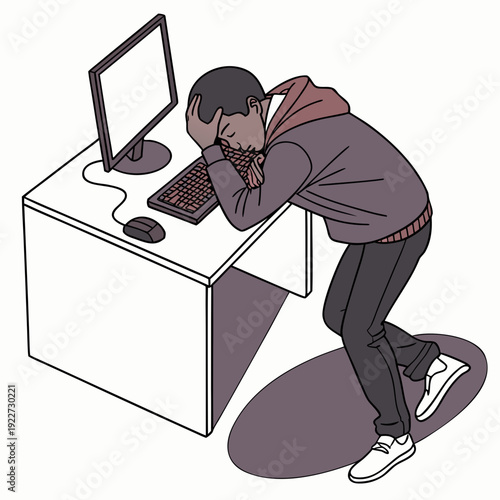 A man sitting at a desk looking stressed while working on a computer