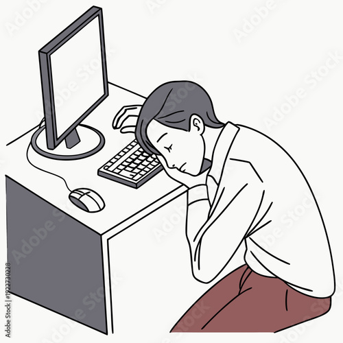 A person looking stressed while working on a computer