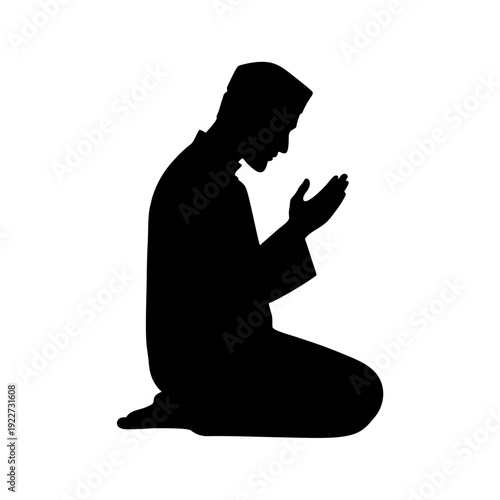 silhouette of a Muslim sitting in prayer