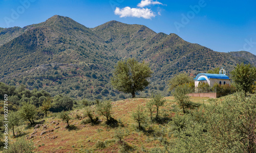 view on Christian orthodox church in montainous green landscape  in Peloponne...
