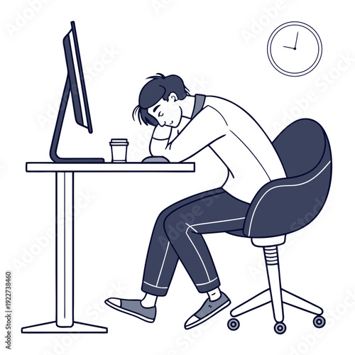 A man sitting at a desk appearing tired and sleepy