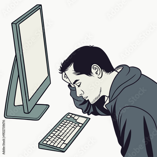 A man looking at a computer screen with a mixture of shock and disgust