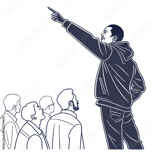 A man pointing to something with three people looking on