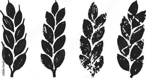 Set of four rustic wheat ears silhouettes vintage grain icons with textured distressed