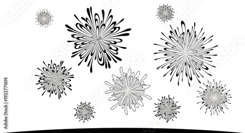 Abstract black and white explosion of shapes, artistic design elements.