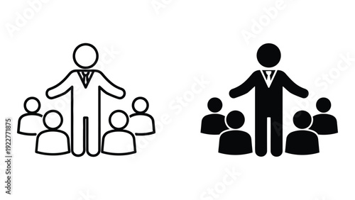 Business leader stands confidently presenting ideas to a small group of attentive team members during a meeting