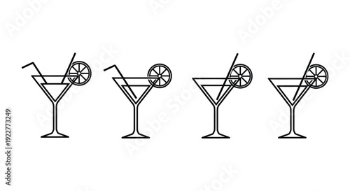 Four martini glasses with straws and lemon garnish 
