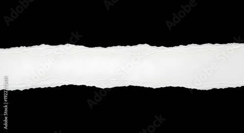 Ripped white paper texture with rough edges on black background for design and creativity inspiration