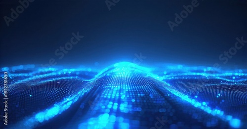 Abstract digital landscape. Glowing blue particles form undulating waves, creating futuristic terrain. Dark background emphasizes bright illumination.