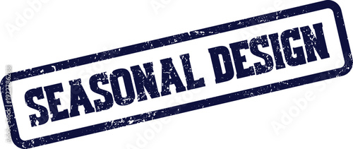 A distressed blue stamp imprint clearly displaying the important text Seasonal Design