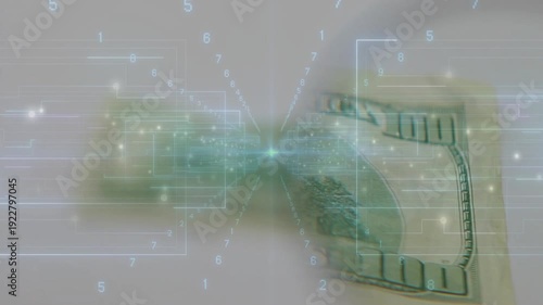 Fingertip touching edge folded US 100 bill sliding rotating revealing back front under HUD for scan