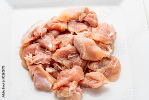 Strips of raw chicken or turkey breast, skinless and boneless chicken breast. Chicken breast is a high-protein food.