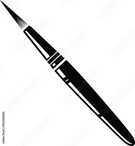 A black ballpoint pen on a white background