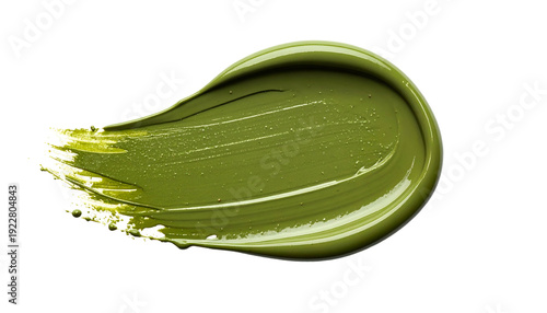 Macro shot of a vibrant olive-green, smoothly textured paint smear against black