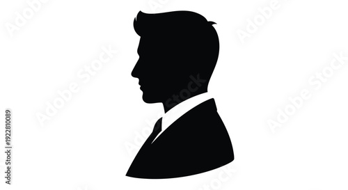 Silhouette of a man's profile in a suit facing right against a white background