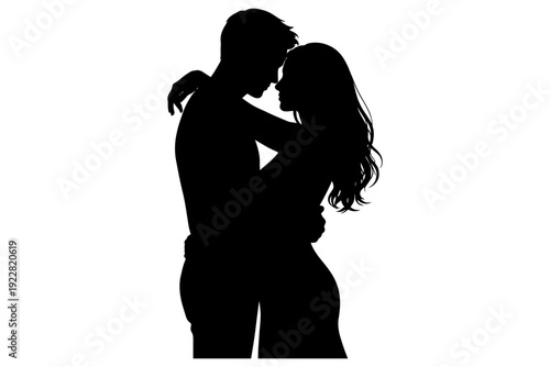 Silhouette of romantic embrace between young adult couple.
