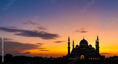 Mosque Silhouette at Vibrant Sunset Sky.