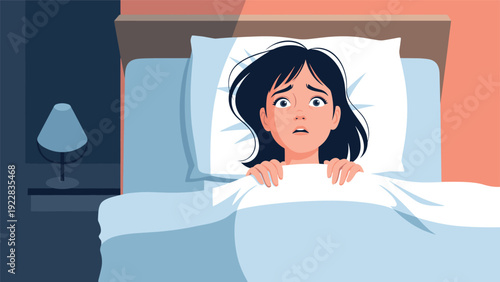 Young woman shows a terrified expression while lying in bed at night under the covers during a scary nightmare or experiencing insomnia.