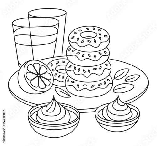 A delightful stack of donuts with a side of lemon and dipping sauce