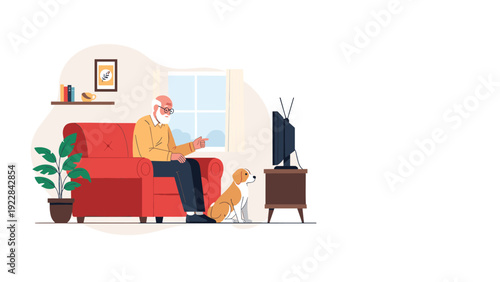 Contented elderly man sitting in a red armchair watching television in his living room with his pet dog by his side.