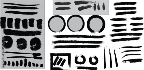 A collection of various black brush strokes and shapes on a white background