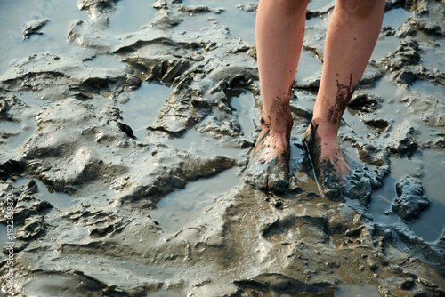 Bare Feet in Muddy Water
