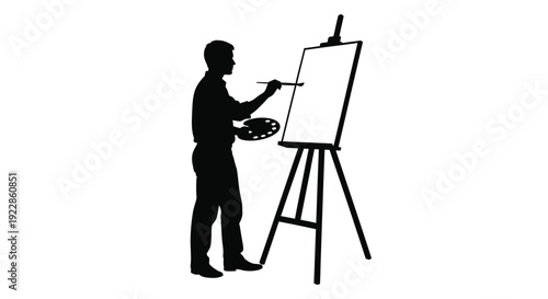 Silhouette of an artist painting at an easel with a palette