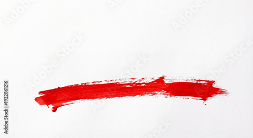 A single bold red brushstroke across a clean white background, evoking simplicity and artistic expression