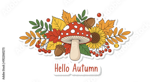 Beautiful autumn composition with a red mushroom, sunflowers, oak leaves, and acorns with hello autumn greeting.
