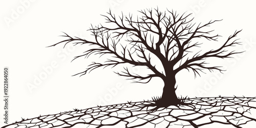 A solitary barren tree standing amidst a dry and cracked landscape under a clear sky