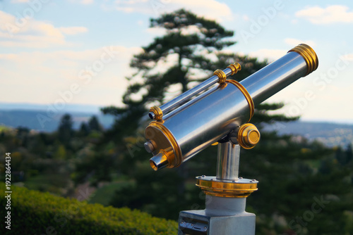 This is a big, metallic retro telescope for tourists.