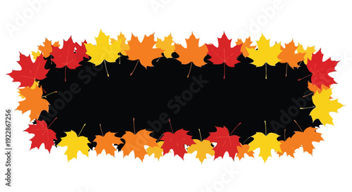 Autumnal maple leaves frame a dark rectangular space creating a seasonal border