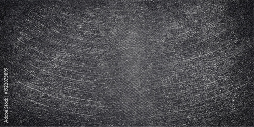 A dark grunge wallpaper featuring a rough black leather material texture and vintage textile pattern with a macro gray surface structure for a textured fabric background design