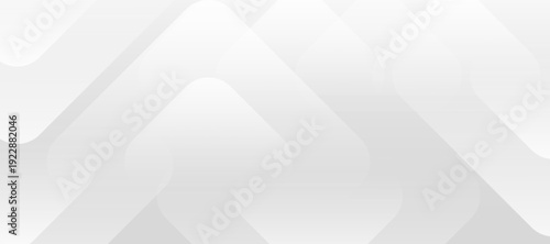 Modern architectural structure viewed from a low angle, emphasizing geometric shapes and clean lines in a minimalist environment.