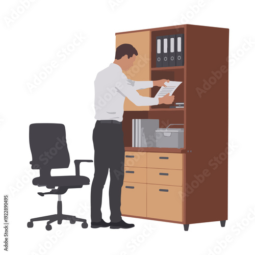 A man in an office setting standing next to a filing cabinet and chair