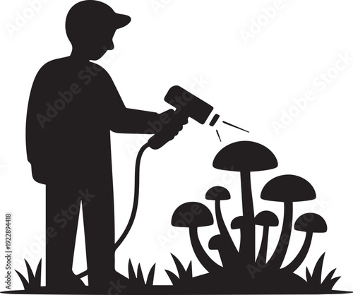 Farmer spraying mushrooms with pesticide using spray gun