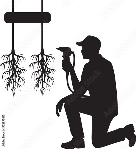 Agriculture worker silhouette using sprayer tool on plant root system