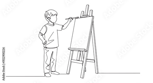 A young artist meticulously paints on a canvas on an easel, capturing a creative moment
