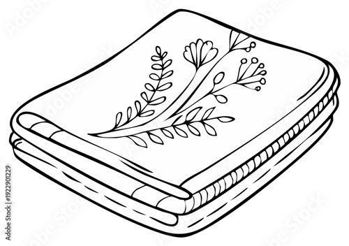 Neatly folded blanket or towel with a beautiful hand drawn floral botanical line art design