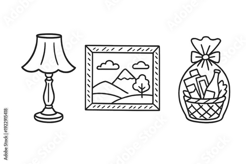 A set of three black and white line art icons featuring a classic table lamp, a framed landscape painting with mountains, and a gift basket wrapped with a bow.