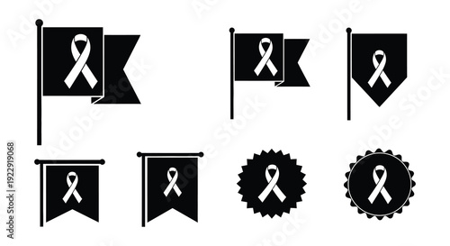 Black flags and emblems featuring a white ribbon symbol displayed