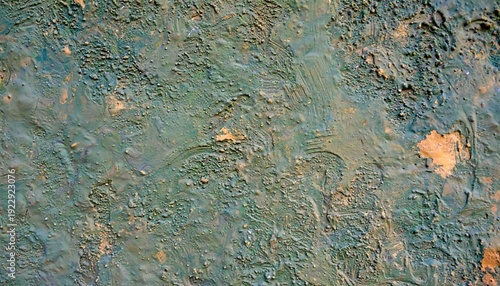 Closeup of textured terracotta surface with green brown hues and visible brush strokes