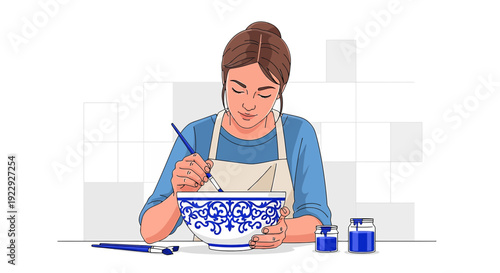 Woman Painting Blue Floral Pattern on Ceramic Bowl