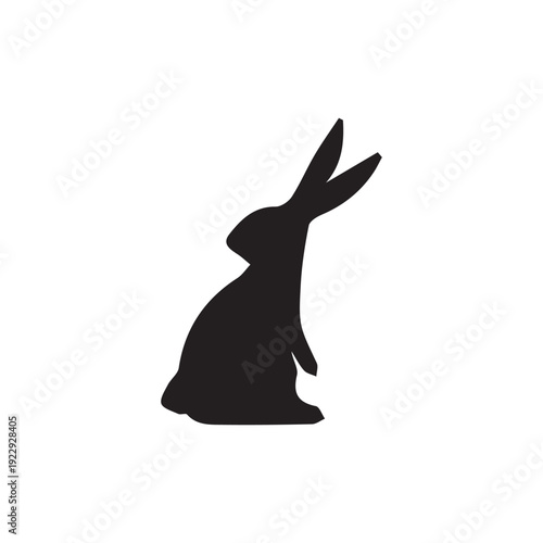 Black silhouette of a rabbit sitting upright with alert ears, a cute and iconic representation of a bunny on a white background.