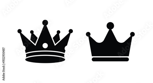 Two black silhouettes of royal crowns against a white background