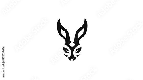 Minimalist black and white stylized rabbit or hare head illustration, an abstract animal emblem or logo design element for graphic projects.