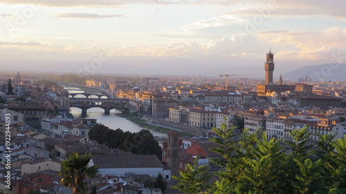 Panoramic view of Florence, Italy, at sunset. Famous view on Firenze and Santa Maria del Fiore Cathedral from the Michelangelo Square (Piazzale Michelangelo) in Florence, Tuscany, Italy