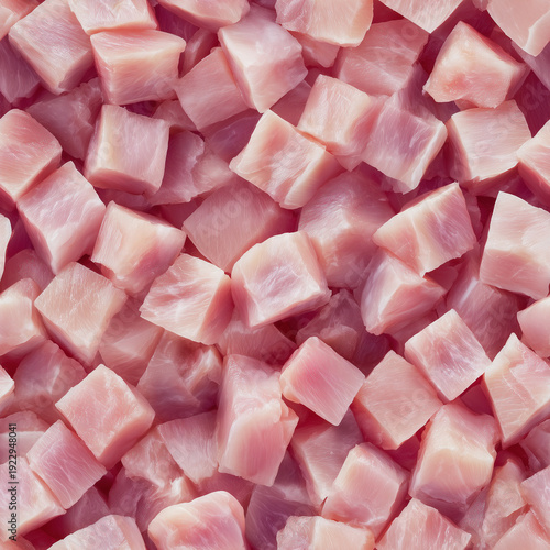 Seamless pattern of cubed raw chicken for infinite repeating backgrounds or textures