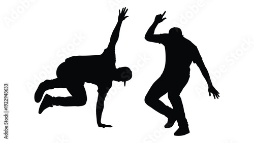 Silhouettes of two people mid movement seemingly dancing or performing acrobatic poses